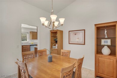 Dining area featuring light tile patterned floors,