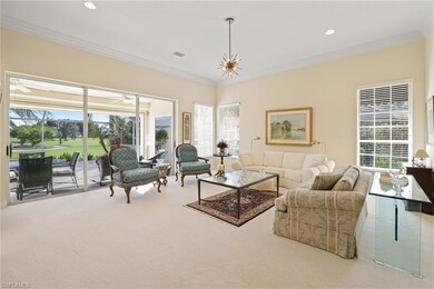 Living room with crown molding, plenty of natural 