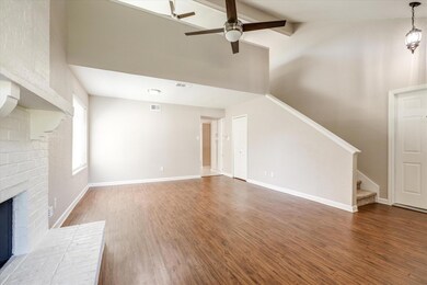 Another view of the entry to the home. This inviting and versatile floorplan boasts new interior paint and carpet in 2023!