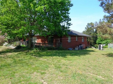Rear left hand side of the home with the huge rear