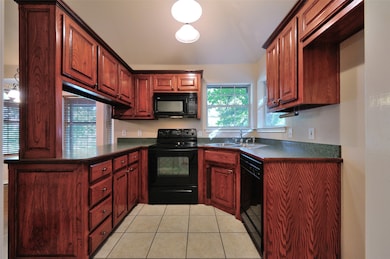 Plenty of Cabinets and Corner Window to Watch the Wildlife in Back.
