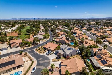 Aerial view of residential area featuring a mounta