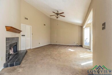 Unfurnished living room with ceiling fan, lofted c