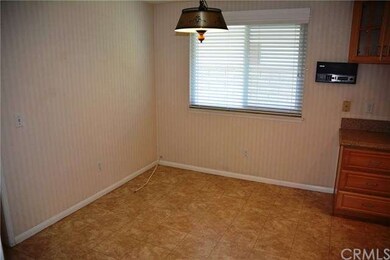 The Kitchen Dining Nook provides a setting for cas