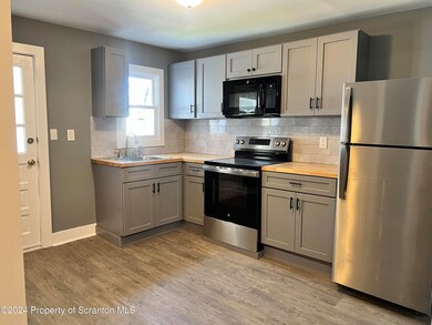 125 Carlisle St unit 2nd flr, Wilkes Barre, PA 18702 - photo 3