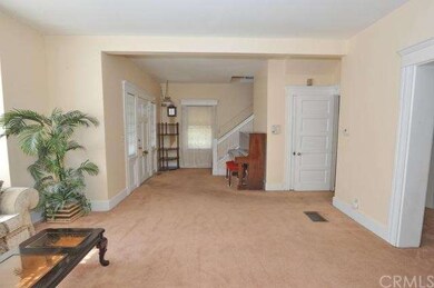 LIVING ROOM FACING FRONT DOOR