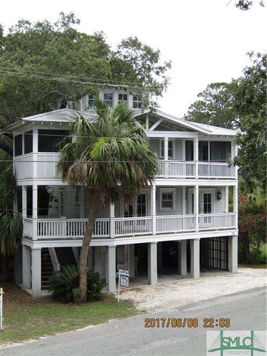 Tybee raised beach cottage with lots of covered pa