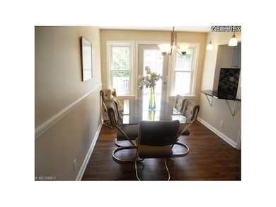 Formal Dining Room with Gleaming Hardwood Floors a