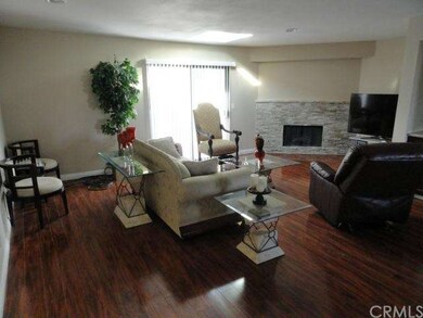Living room with stone fireplace and Slider to 3rd