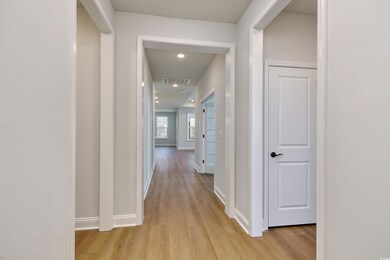 Hall with light wood-type flooring