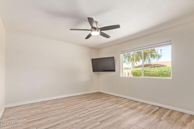 Primary Bedroom with View of Pool