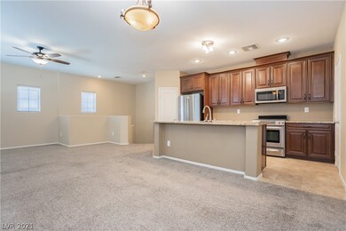Island kitchen with granite counters, stainless st