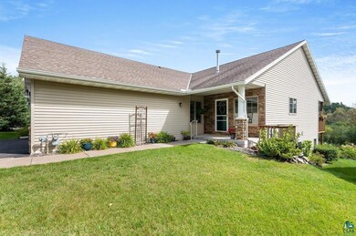 View of front of property featuring a front yard