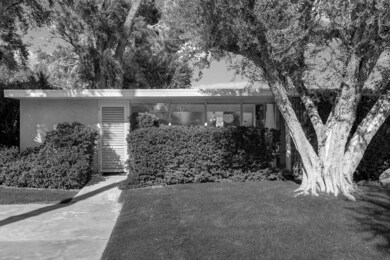 FRONT OF HOME BLACK AND WHITE.jpg mls