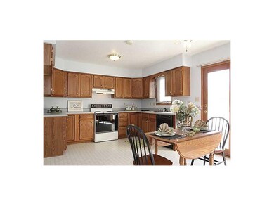 Kitchen. Spacious kitchen is open to dining area a