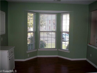 Breakfast. Breakfast area is nestled in gorgeous bay windows which allow plenty of natural light.