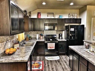 Beautiful kitchen, with lots of cabinet space.