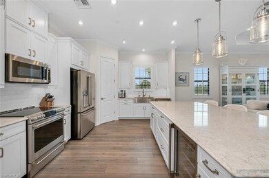 Kitchen with a sink, visible vents, a wealth of na