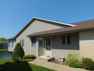 1100 Amber Ridge Dr SW unit 106, Byron Center, MI 49315 - photo 2