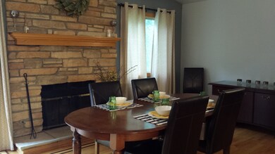 This Family Room is being used as a DR but can cer