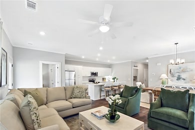 living room leads out to covered porch
