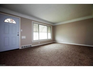 The living room is spacious and is waiting for you