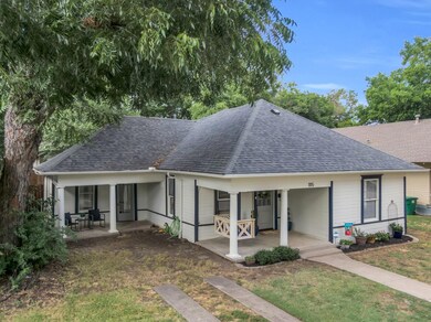 Bungalow-style house featuring a front lawn and a 