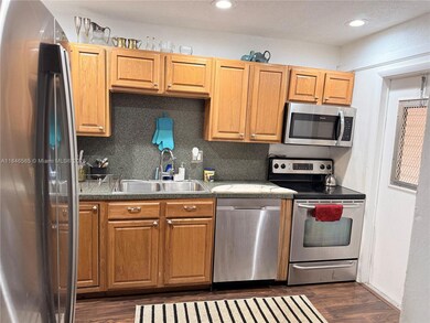 215 SE 3rd Ave unit 102C, Hallandale Beach, FL 33009 - photo 3