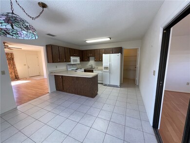 Kitchen with dining area and pantry