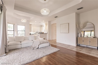 Large open family room with volume ceilings