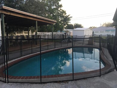 Pool on side of house
