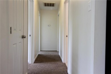 Hall leading to bedrooms
