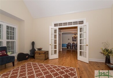 French doors with transom and plantation shutters 