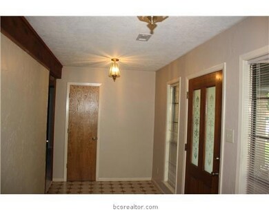 Other. The front hall is large with a nice coat cl