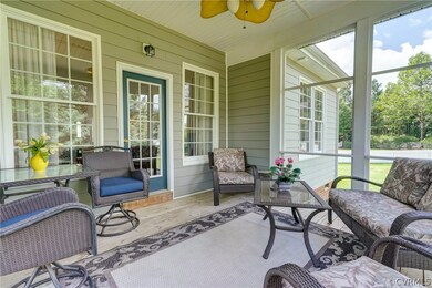 Screened Porch, with ceiling fan / light, is the p