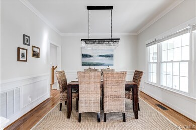 Dedicated dining space with stunning light fixture