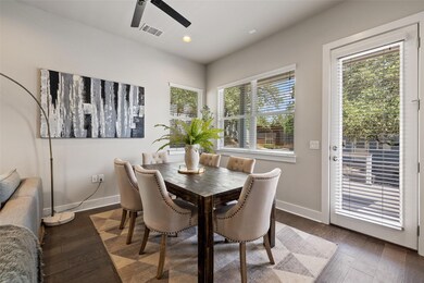 Dining area featuring wood finished floors, visib