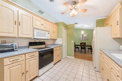 Kitchen overlooks dining area and includes breakfa