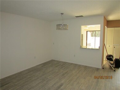Dining room and kitchen pass-through.