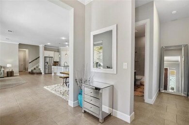 Open foyer invites you inside...high ceilings thro