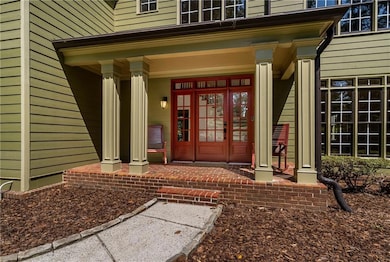 The rocking chair front porch exudes southern charm.