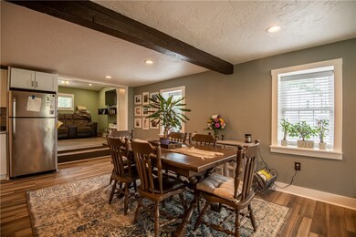 Recessed lighting along with plenty of natural lig