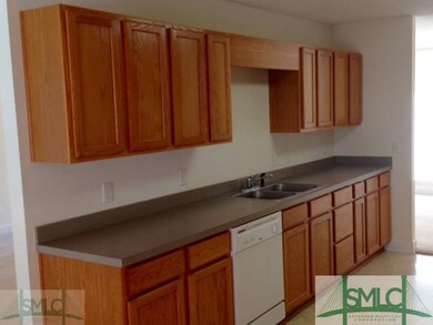 Kitchen. Left side of kitchen. Space above sink co