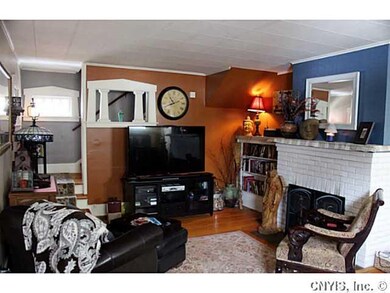 Living Room wood burning fireplace and built-in sh