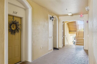3338 Robert Trent Jones Dr unit 307, Orlando, FL 32835 - photo 2