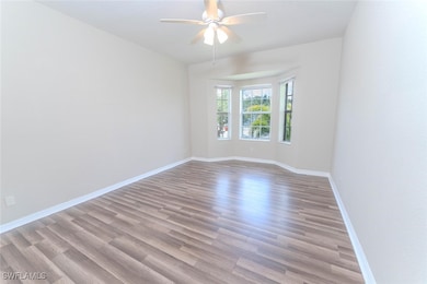 Unfurnished master room featuring wood finished fl