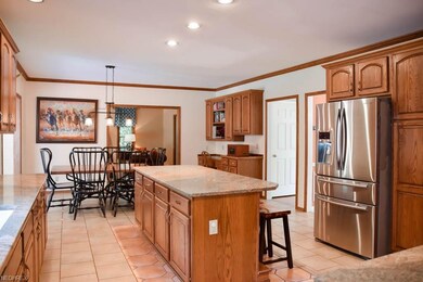 The kitchen is enormous with tons of counter and c