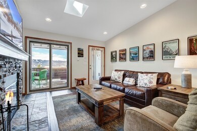 Living room with recessed lighting, vaulted ceilin