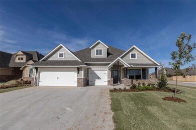 Craftsman house featuring a porch and a front lawn