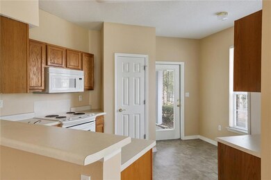 Kitchen, back door opens up to patio